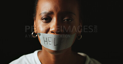 Buy stock photo Woman, tape and mouth for help in studio for silence, voice and censorship by black background. African person, portrait and text on lips with depression, sad and mental health with space in Nigeria