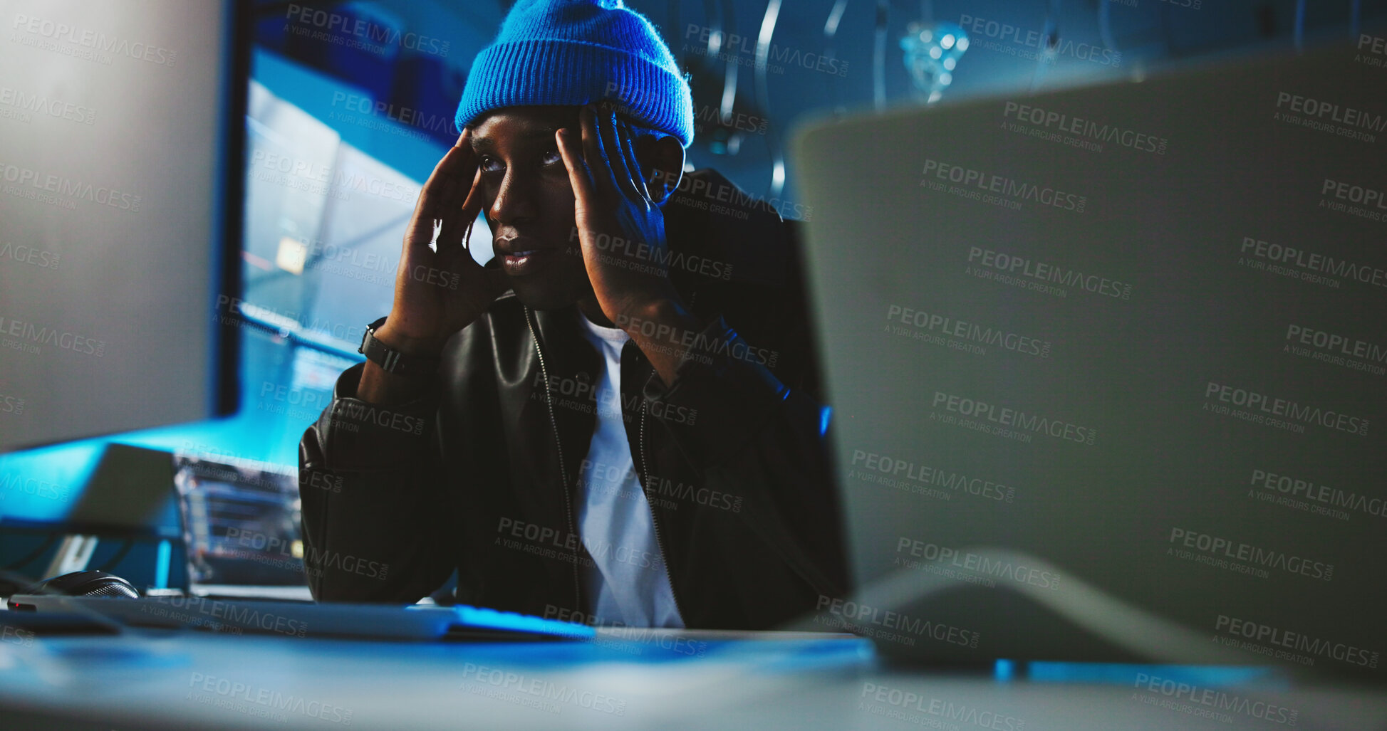 Buy stock photo Night, hacker and man with stress, computer and risk of detection, thinking and worried for failure. Contemplating, programmer and black person with anxiety for ransomware, fraud and spy in office