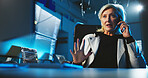 Hacker, woman and phone call at computer for cyber crime, negotiation or contact for scam. Explain, talking or underground with tech for data phishing, ransomware development or corruption in night