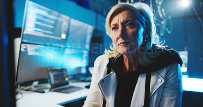 Buy stock photo Mature woman, reading and computer at night for programming, cyber attack and online information. Female person, pc and research for website phishing, data protection and criminal for hacking danger