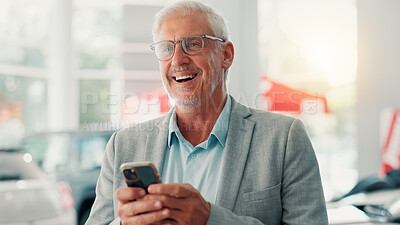 Buy stock photo Businessman, happy and online with phone for dealership, thinking and website for car rental service. Showroom, mature person and seller with mobile for inventory information, vehicle shop and laugh