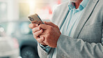 Businessman, hands and typing with phone for dealership, reading and website for car rental service. Closeup, mature person and seller with mobile for inventory information, vehicle shop and scroll