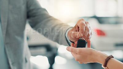 Buy stock photo Hands, salesman and customer with keys in car dealership, test drive and success purchase of motor. Showroom, people and giving equipment in closeup after buying vehicle, rental service or automobile