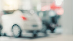 Blur, store and business with cars at dealership for test drive, auto showroom and vehicle choice. Sales, automobile and transportation option in retail for rental agreement, shopping and driver lot