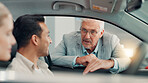 Drive, salesman and couple with discussion in car dealership, transport model and rental service. Showroom, people and mature seller with pitch for vehicle features, assistance and talking by flare