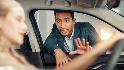 Buy stock photo People, customer and salesman with discussion for car showroom, transport model and rental service. Dealership, woman and male seller with pitch for vehicle features, test drive and talking by flare