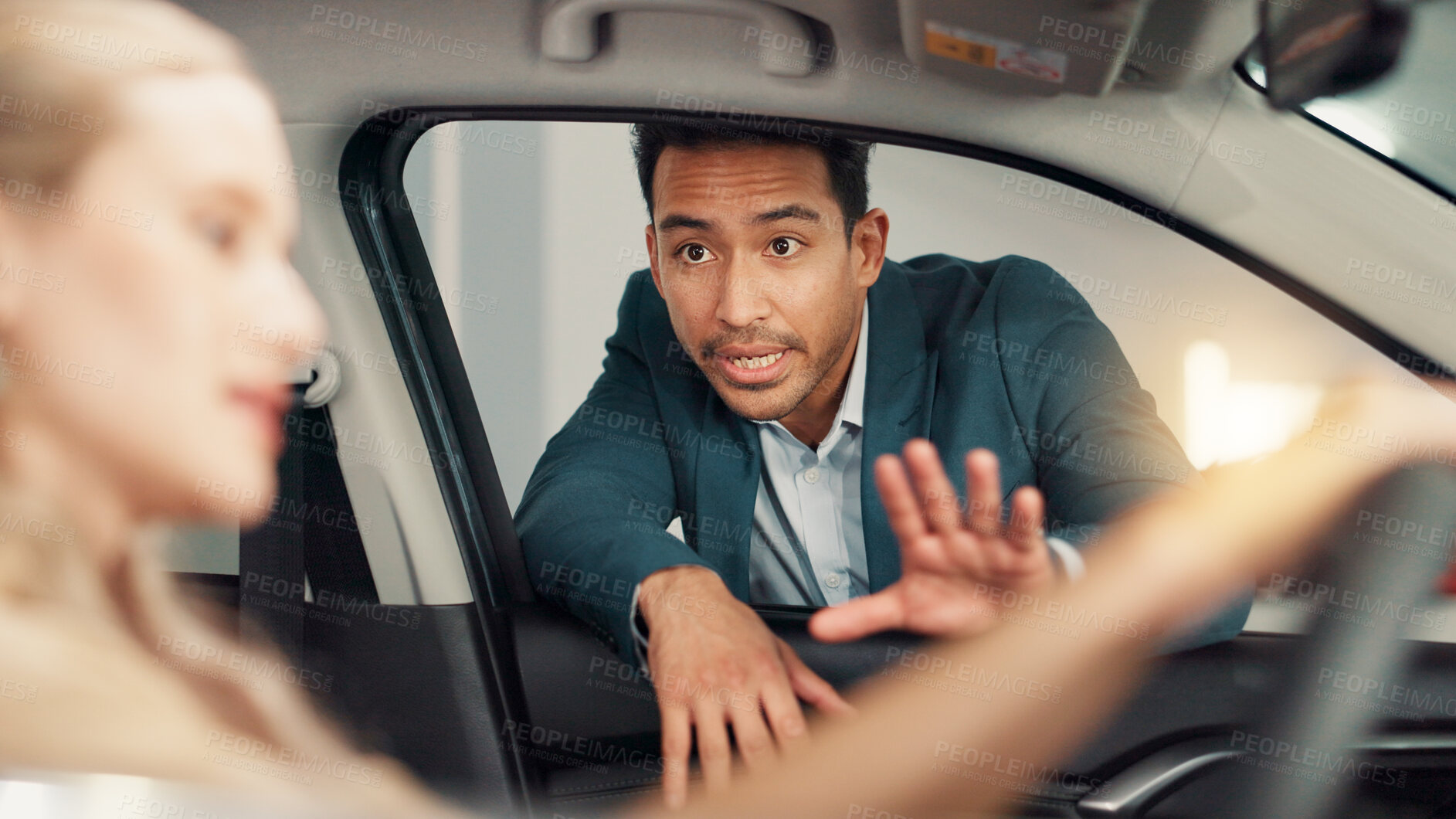 Buy stock photo People, customer and salesman with discussion for car showroom, transport model and rental service. Dealership, woman and male seller with pitch for vehicle features, test drive and talking by flare