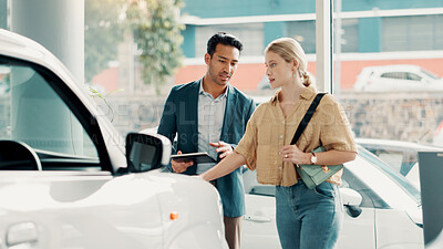 Buy stock photo Tablet, customer and salesman with pitch for car dealership, transport model and motor for rental service. Showroom, woman and male seller with tech for assistance, vehicle features and communication