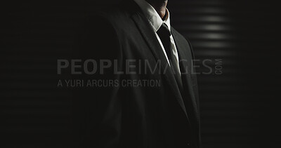 Buy stock photo Mafia, space or man in suit on dark or black background in secret mission, mystery and hidden identity. Spy, studio mockup or hitman with tie, assassin style or classic fashion for crime syndicate