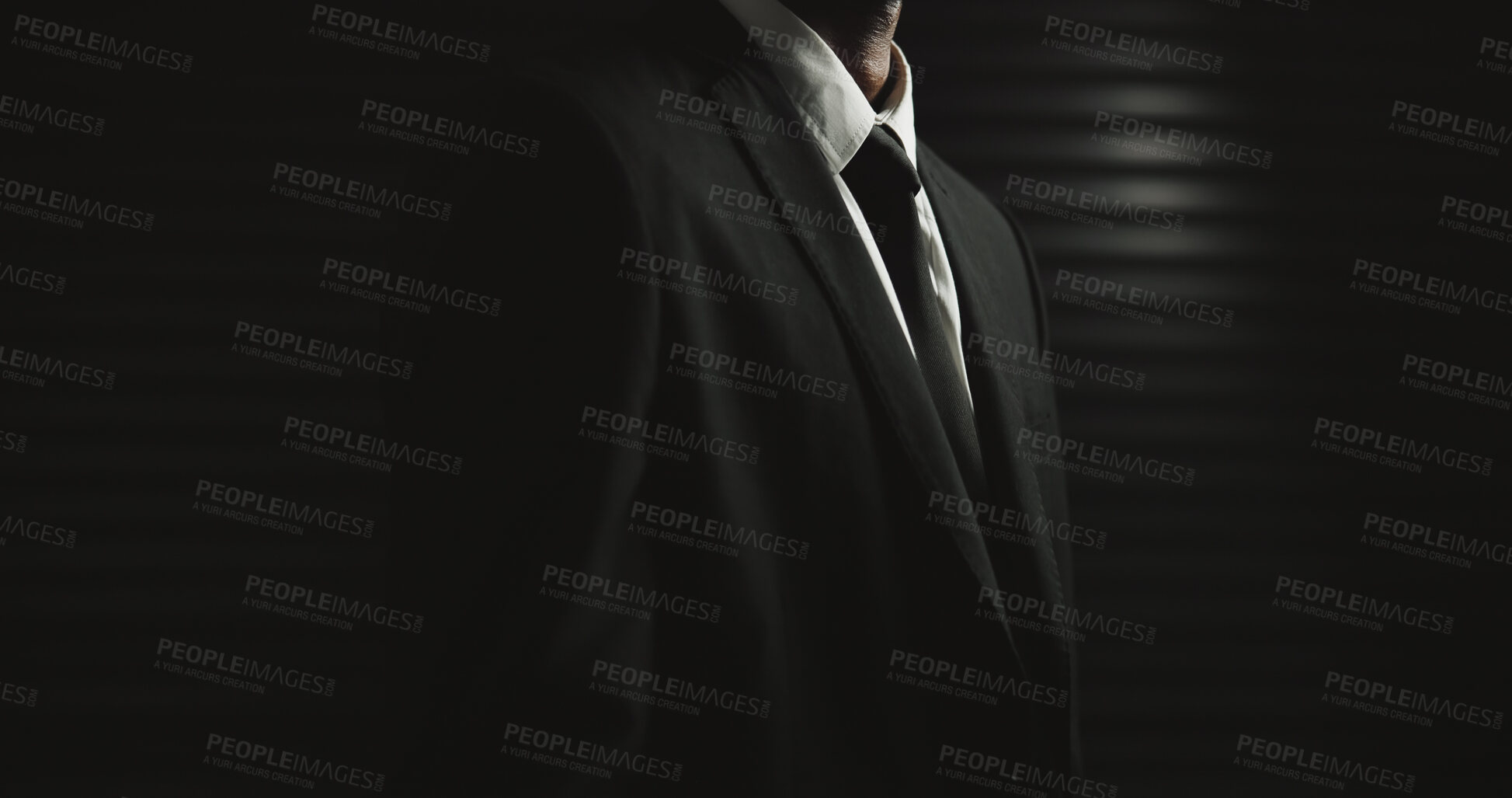 Buy stock photo Mafia, space or man in suit on dark or black background in secret mission, mystery and hidden identity. Spy, studio mockup or hitman with tie, assassin style or classic fashion for crime syndicate