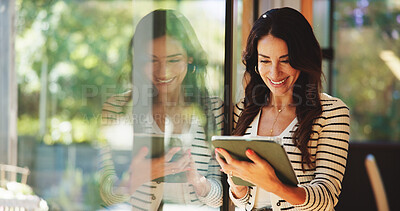 Buy stock photo Remote work, tablet and smile of woman at window in living room of apartment for planning or research. App, download and information with happy freelancer in home office for feedback or review