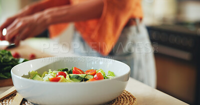 Buy stock photo Home, person and salad bowl in kitchen for healthy dinner, organic recipe and cooking for nutrition. Closeup, meal preparation and vegetable ingredients for brunch cuisine, vegan food and fresh dish