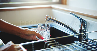 Buy stock photo Glass, hands and water with person in kitchen of home for health, hydration or wellness closeup. Drink, faucet and thirsty with woman at sink in apartment for beverage or natural refreshment