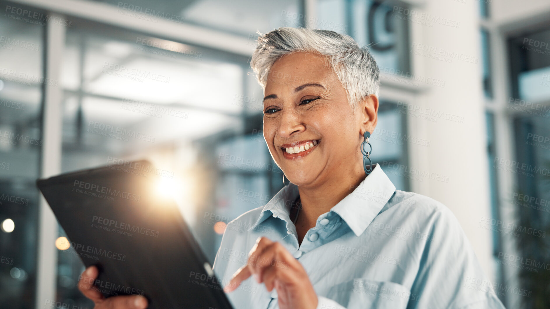 Buy stock photo Business, smile and tablet with mature woman in office for administration, planning or research. App, finance and report with happy employee in corporate workplace for review of account information