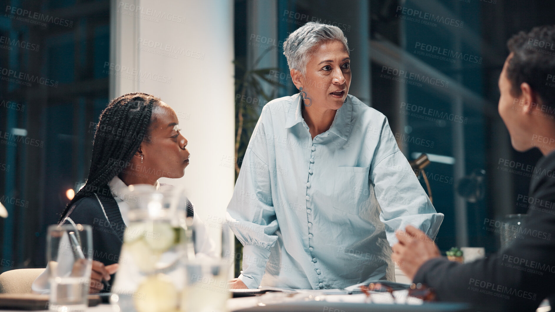 Buy stock photo Collaboration, meeting and pitch with business people in office boardroom at night for planning. Discussion, project management and report with employee team in workplace for late evening proposal