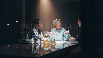Buy stock photo Documents, teamwork and business people at night meeting for overtime, planning or office. Creative startup, collaboration and man and woman working on project, proposal and brainstorming in dark