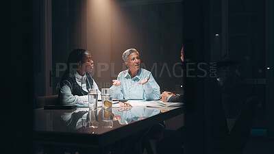 Buy stock photo Feedback, teamwork and business people at night meeting for overtime, planning or research. Creative startup, collaboration and man and woman working on project, proposal and brainstorming in office