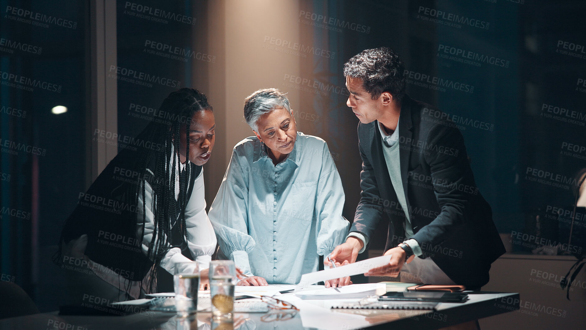 Buy stock photo Management, paperwork and business people at night meeting for overtime, planning or research. Creative startup, collaboration and man with woman for project, proposal and brainstorming in office