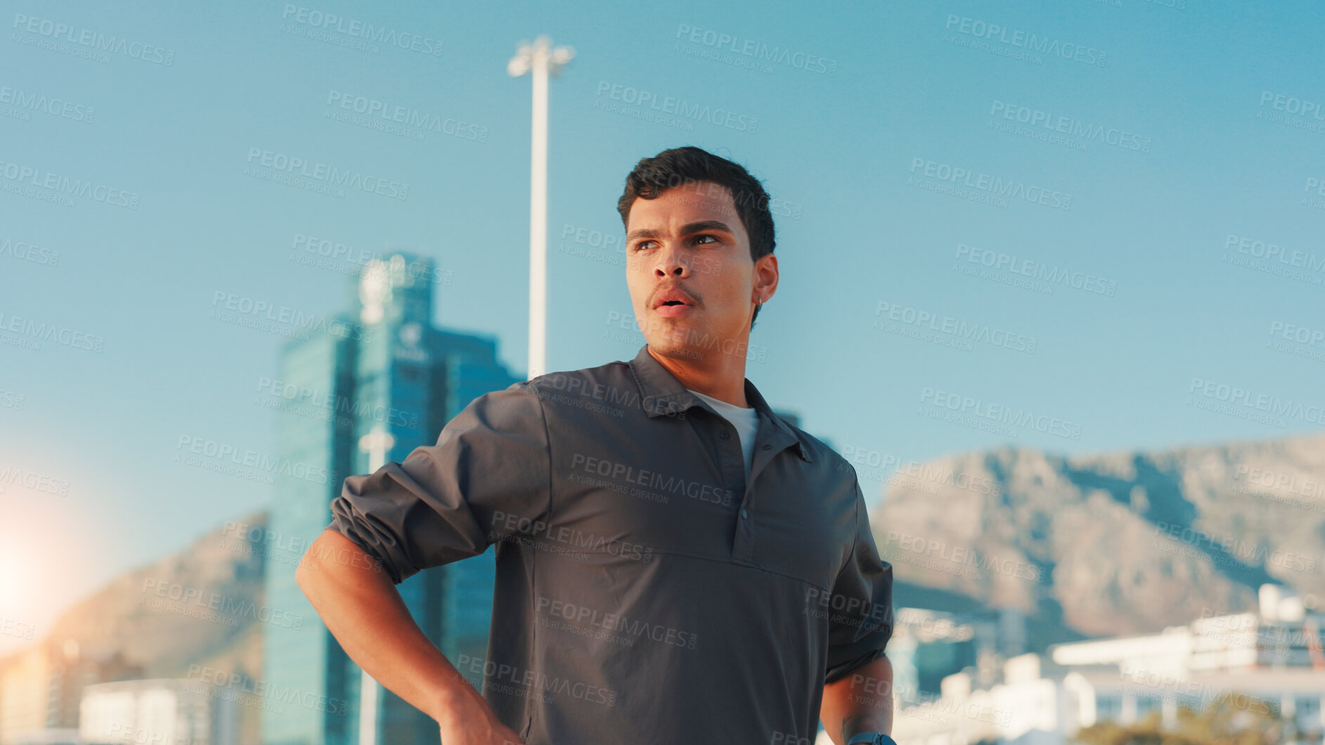 Buy stock photo Breathing, fitness and thinking with man in city for break from cardio training or running. Exercise, fatigue and intense with athlete or runner outdoor in urban town for sports, vision or workout