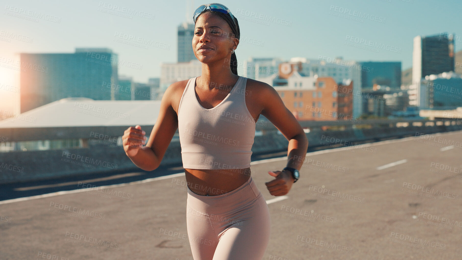 Buy stock photo Black woman, running and fitness with city street for workout, cardio exercise or outdoor training. Active, female person or runner on road for physical activity, health or wellness in an urban town