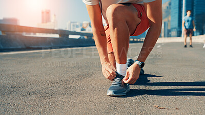 Buy stock photo Person, hands or tying shoes in city street for fitness preparation, workout or exercise. Closeup, active or runner getting ready with tie or laces on road for cardio training, sprint or race in town