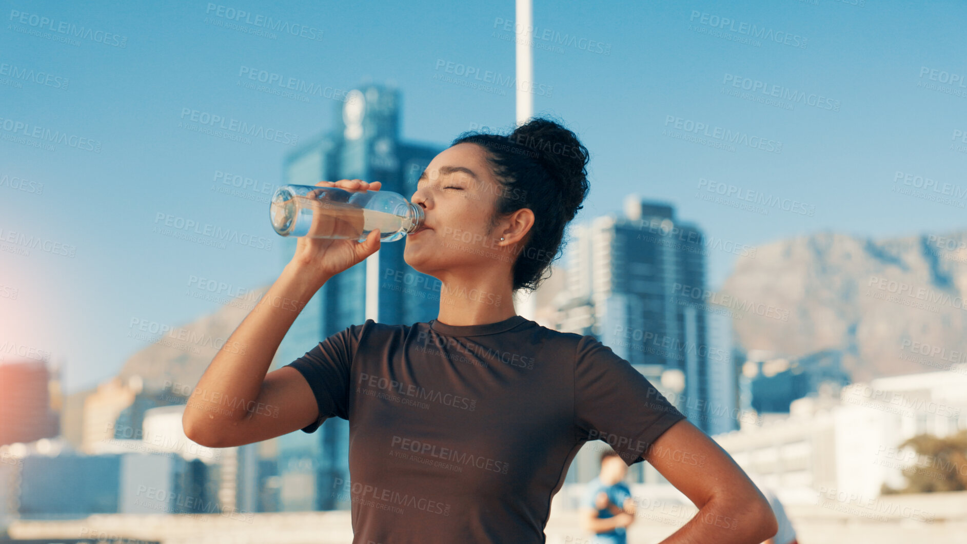Buy stock photo Woman, fitness or drinking water in city for break, natural sustainability or refreshment. Active, female person or thirsty runner with mineral liquid or aqua beverage for hydration, recovery or rest
