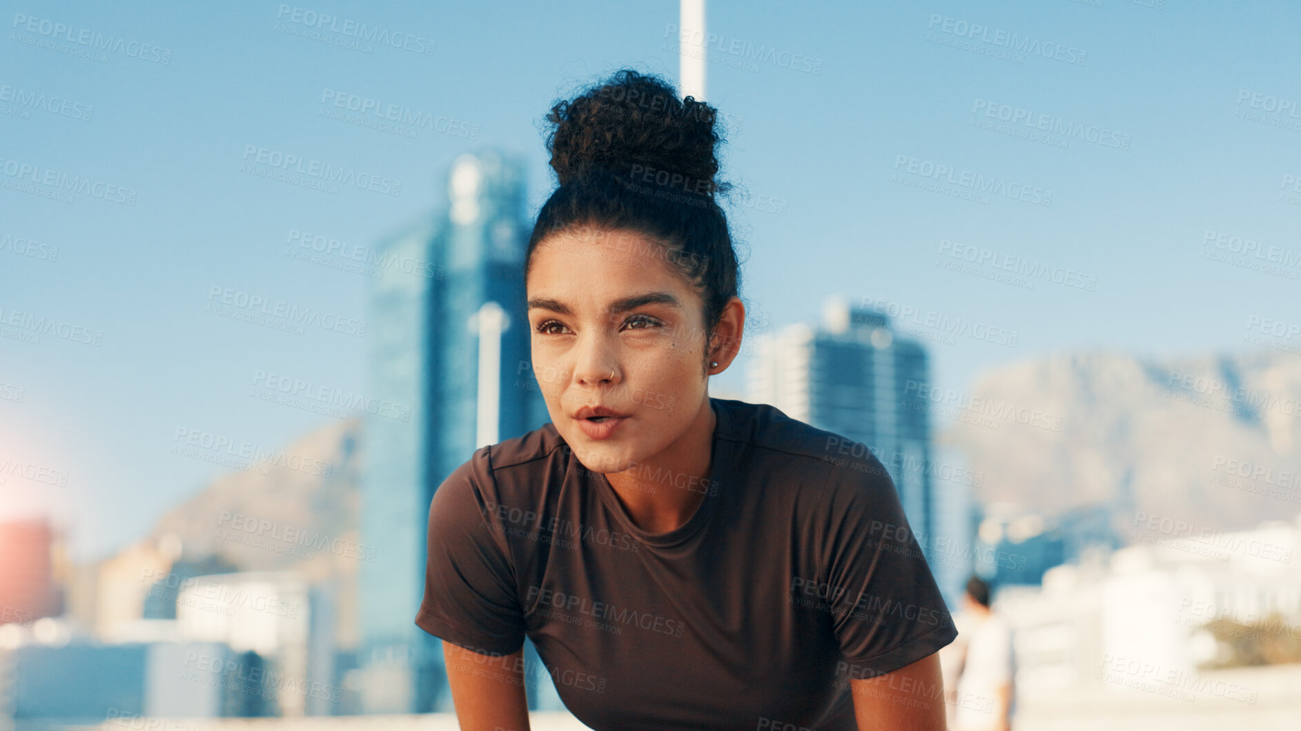 Buy stock photo Breathing, exercise and thinking with woman in city for break from cardio training or running. Fatigue, fitness and intense with tired runner outdoor in urban town for sports, vision or workout