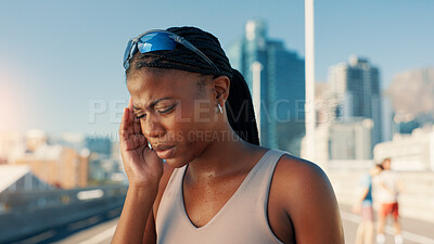 Buy stock photo Fitness, headache and stress with black woman on bridge in city for cardio training or workout. Burnout, exercise and sports with tired athlete or runner outdoor in urban town for marathon fatigue