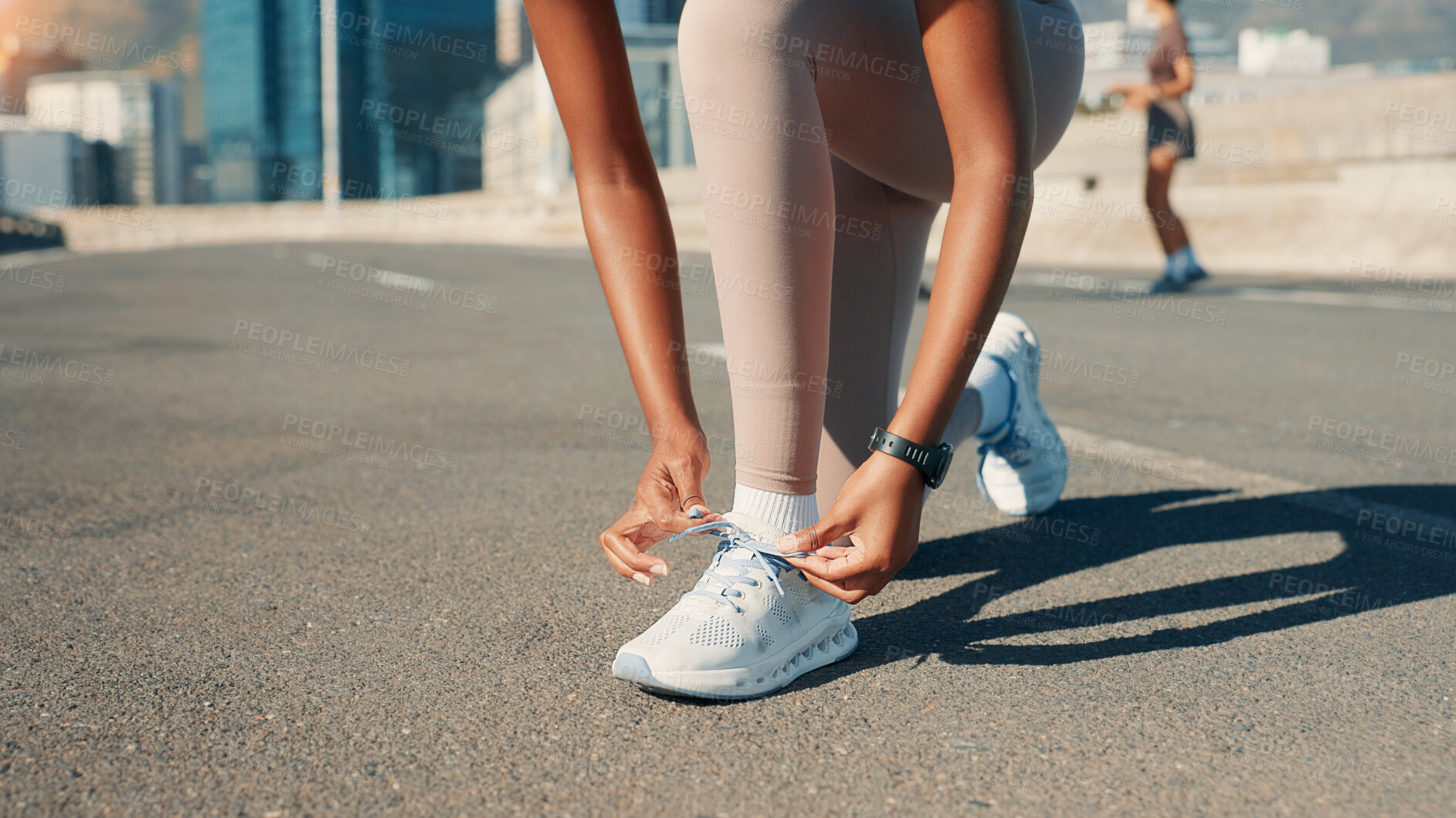 Buy stock photo Person, hands and tying shoes in city street for fitness, workout or outdoor exercise. Closeup, active or runner with sneaker or tie laces in preparation or getting ready for sprint or race on road