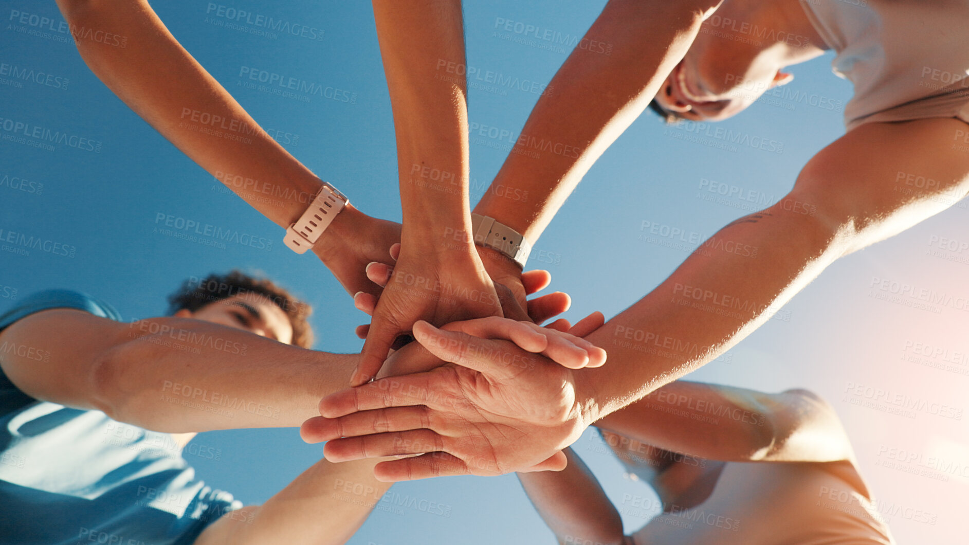 Buy stock photo People, team and hands together in fitness with blue sky below for motivation, unity or mission. Low angle, group or friends piling with stack in huddle, circle or solidarity for health and wellness