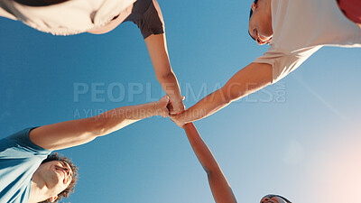 Buy stock photo Fitness, below and friends high five with hands for support, collaboration or solidarity outdoor with blue sky. Team, people and community together for motivation, exercise goal or smile for synergy