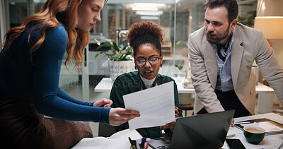 Buy stock photo Business people, document and meeting in office for discussion, project feedback and advice at night. Journalist team, paper and tech in agency for article review, collaboration and late information