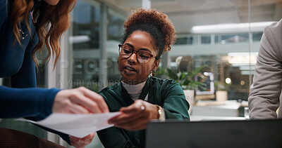 Buy stock photo Woman, document and meeting in office for business, project feedback and review advice at night. Journalist team, paper and tech in agency for article discussion, collaboration and late information
