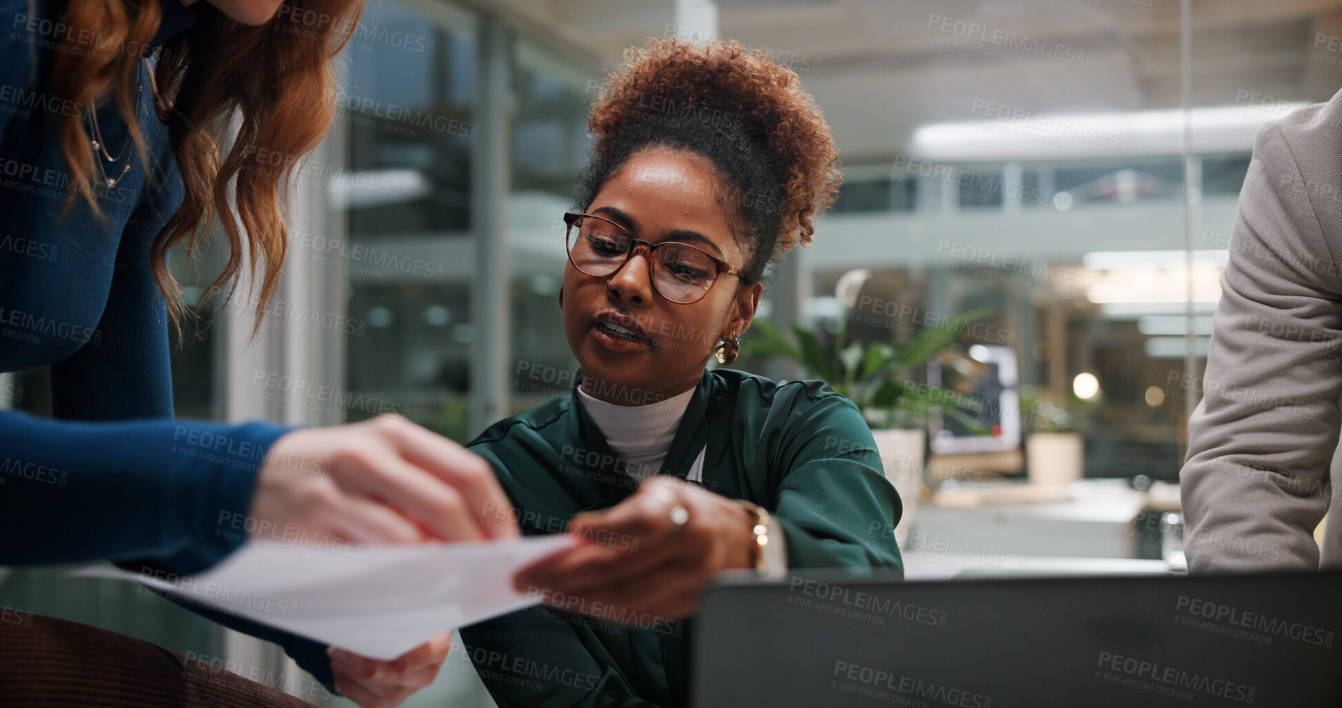 Buy stock photo Woman, document and meeting in office for business, project feedback and review advice at night. Journalist team, paper and tech in agency for article discussion, collaboration and late information