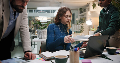 Buy stock photo Business people, paper and meeting in office for discussion, project feedback or advice at night. Journalist team, document and tech in agency for article planning, collaboration and late information