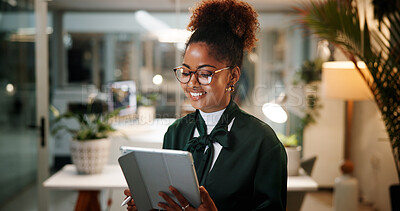 Buy stock photo Office, businesswoman and online with tablet for reading, news information and blog post at night. Late, female person and copywriter with digital for research, article website and smile for deadline
