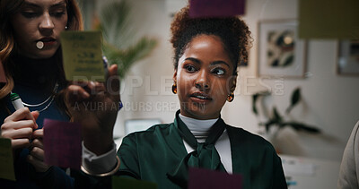 Buy stock photo Brainstorming, team and writing of ideas, meeting or colleagues with vision for marketing strategy. Serious, planning and people with notes for collaboration, brand strategist or discussion in office