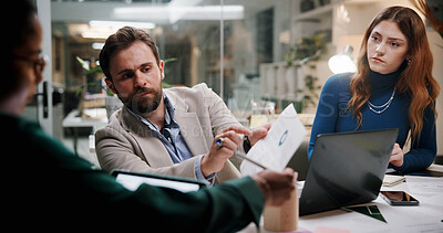 Buy stock photo Business people, document and discussion in office for finance, budget information or planning at night. Admin staff, paperwork and overtime in agency with profit projection, briefing or review offer