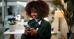 Business woman, cellphone and designer typing in office for communication, overtime or fashion inspiration. Female person, tech and scroll for design feedback, social media and search at night