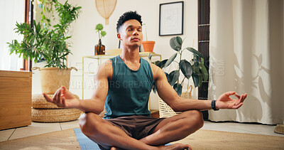 Buy stock photo Man, lotus pose and yoga at house for meditation, zen balance and breathing for mindfulness. Male person, eyes closed and routine of pilates for morning peace, spiritual healing and holistic wellness