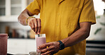 Man, hands and smoothie in kitchen for mixing, healthy diet or meal replacement recipe for wellness. Nutritionist, detox or drink in home for gut health, vitamin boost or supplement in protein shake