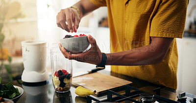 Buy stock photo Berries, blender and hands with person in kitchen of home for preparation of healthy fruit smoothie. Cooking, diet and nutrition with man at counter in apartment for beverage, detox or weight loss