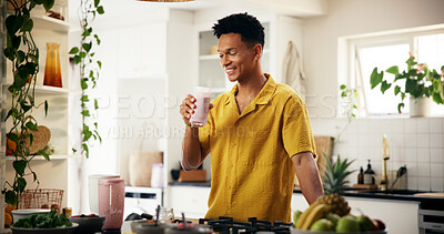 Buy stock photo Man, smile and smoothie in kitchen for detox, healthy diet or meal replacement recipe for wellness. Nutritionist, happy or drink in  home for gut health, vitamin boost or fresh fruit in protein shake