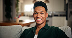 Man, happy and portrait in living room of home, relax with pride and good mood on day off or weekend break. Satisfaction, confidence and male person with smile for holiday at house and chill on sofa
