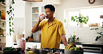 Man, drinking and smoothie in kitchen for detox, healthy diet and meal replacement for wellness. Nutritionist, enjoy and protein shake in home for gut health, vitamin boost and supplement with fruit