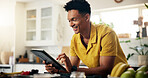Tablet, kitchen and man with recipe online for cooking healthy, wellness or diet dinner. Digital technology, research and person on app for supper preparation tutorial or instructions in home.
