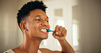 Home, man and dental with toothbrush for wellness, oral care and mouth treatment in morning routine. Bathroom, male person and health with teeth whitening for gum, hygiene and grooming in apartment