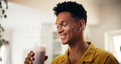Buy stock photo Man, happy and smoothie in kitchen for detox, healthy diet or meal replacement recipe for wellness. Nutritionist, smile or drink in  home for gut health, vitamin boost or fresh fruit in protein shake