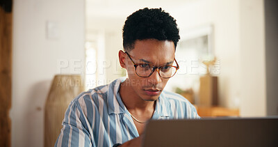Buy stock photo Man, glasses and review on laptop at house for research, proofreading article and report information. Journalist, online and reading news for story update, editing draft and schedule  for publication