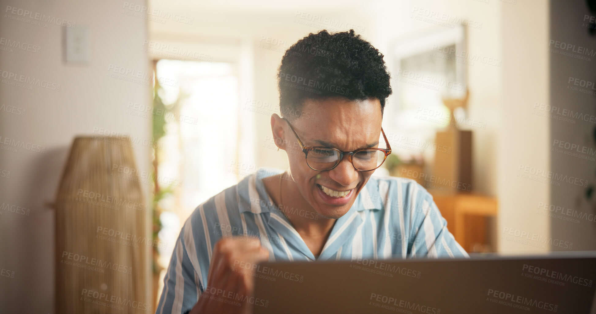 Buy stock photo Laptop, freelancer and fist pump with man in home for virtual assistant, appointment success and client deal. Remote worker, achievement and research with person for feedback, bonus and good news